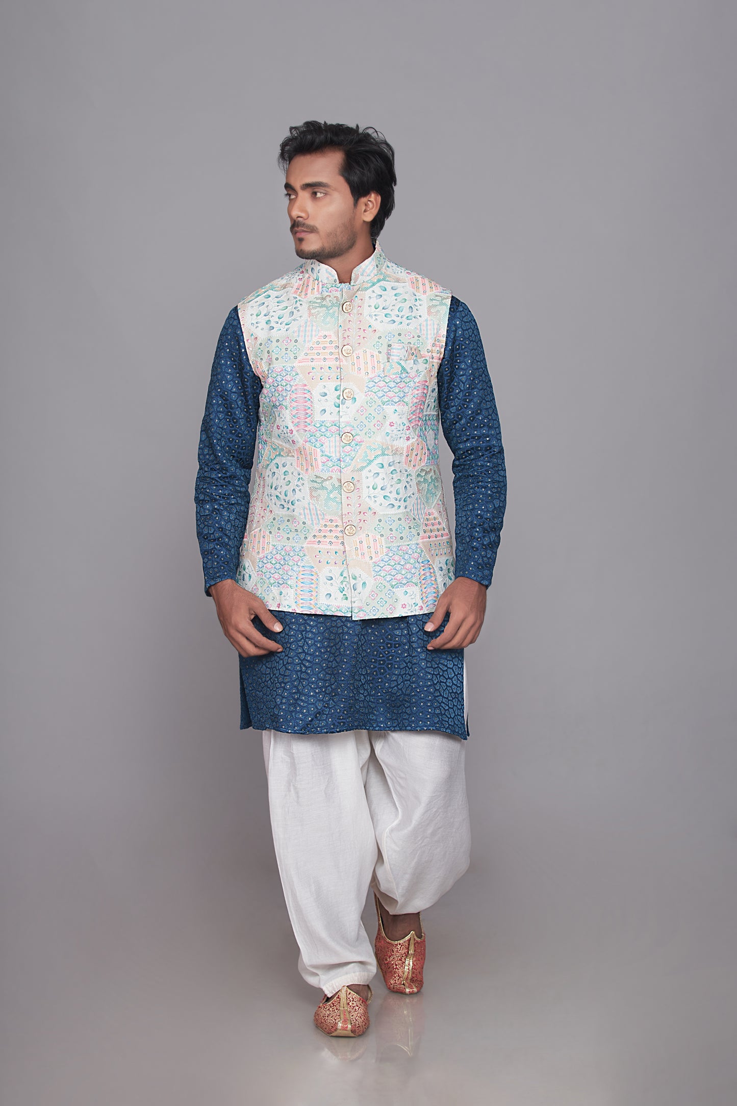 dark blue kurta set with embroidered jacket